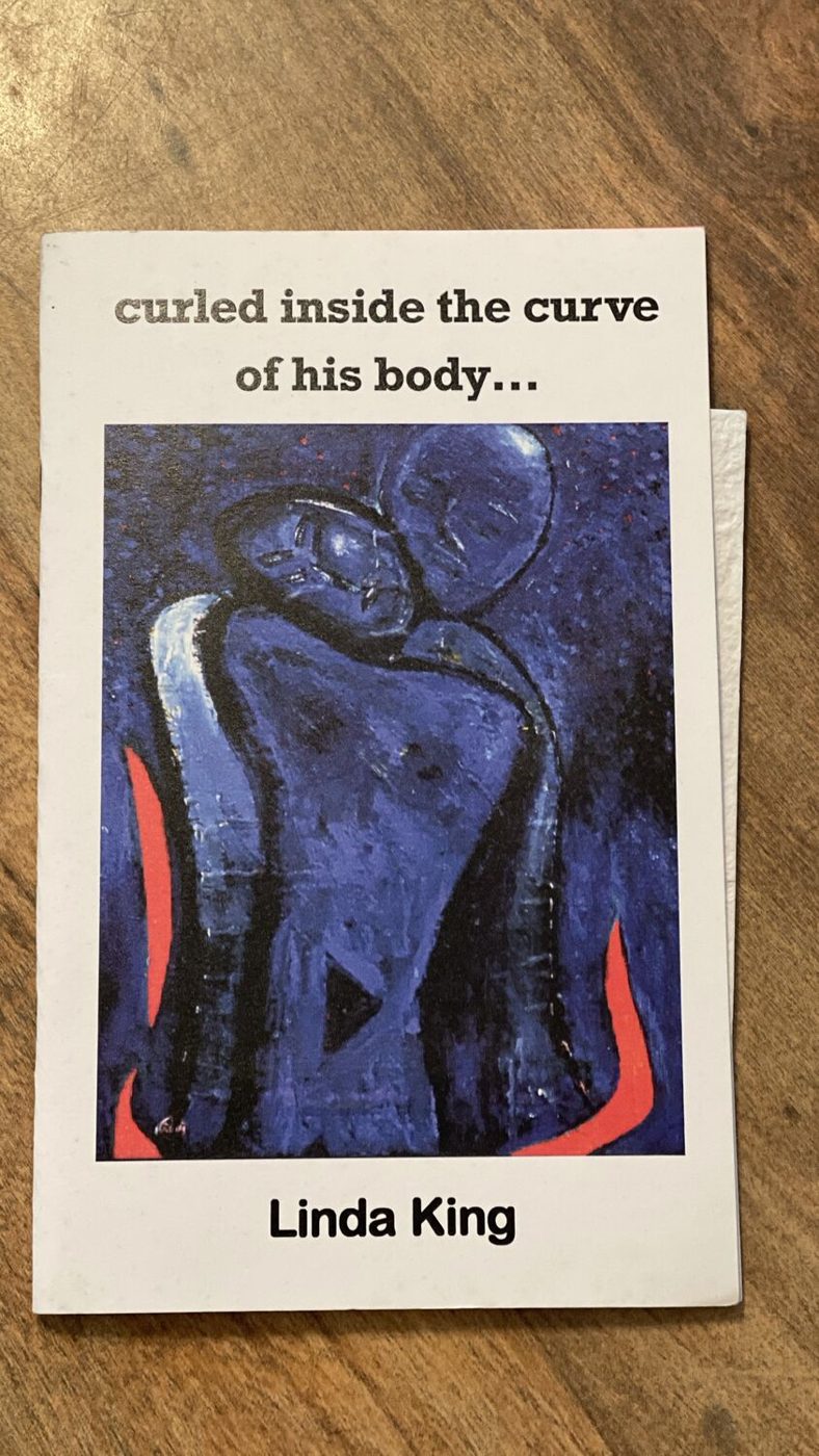 Blue painted cover of Curled Inside the Curve of His Body