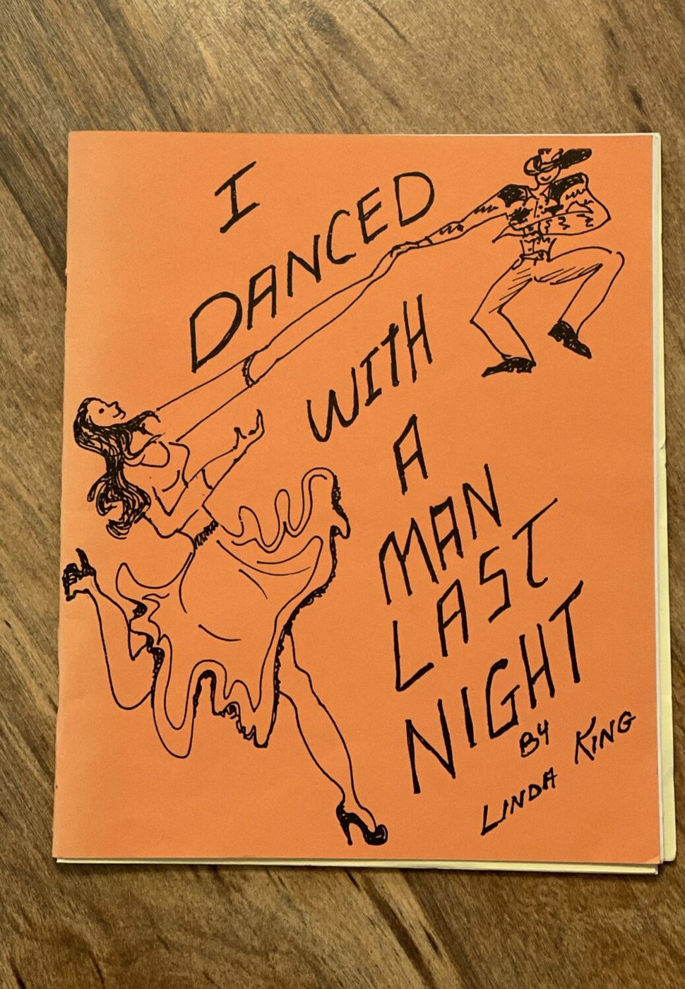 Orange cover of I Danced With a Man Last Night