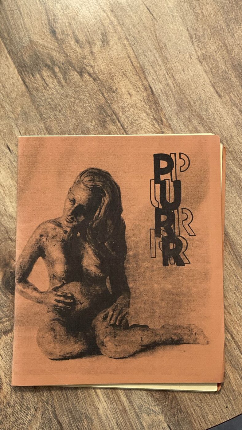Cover of Purr magazine with a drawing of a seated nude figure